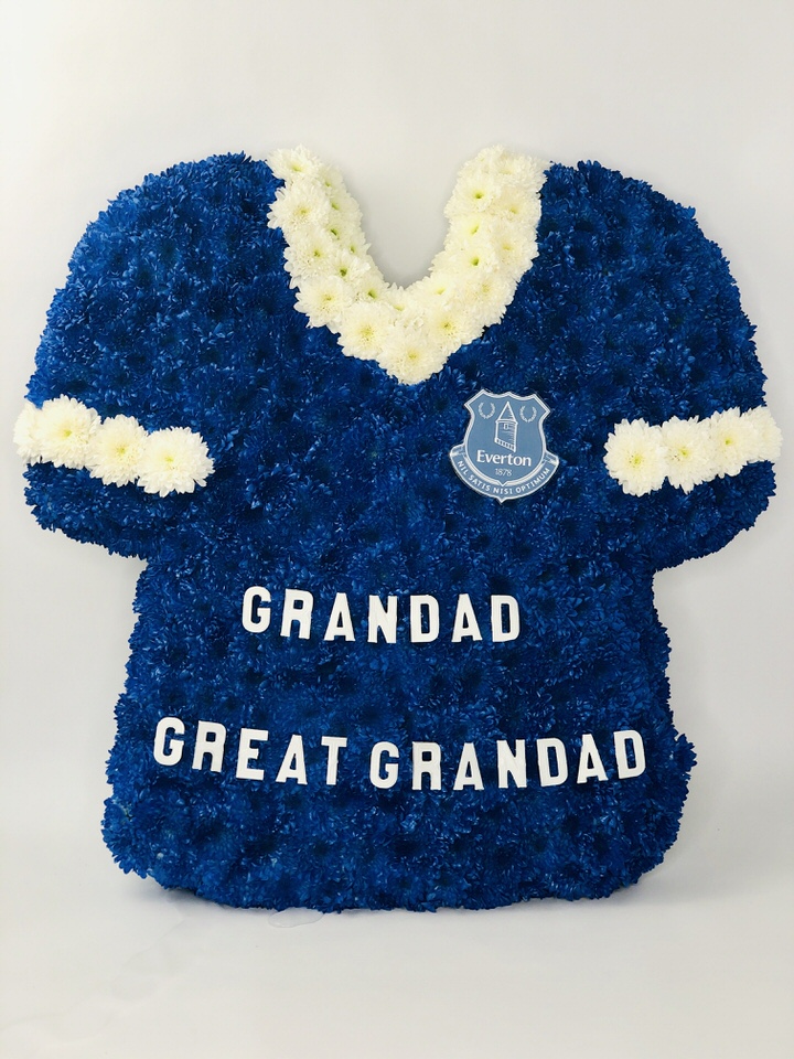 <h2>Bespoke Everton Football Shirt | Funeral Flowers</h2>
<br>
<ul>
<li>Approximate Size W 60cm H 60cm</li>
<li>Hand created blue football shirt with white trim and number</li>
<li>Can be made in any colour for any Football Team</li>
<li>Can be personalised with any NAME and NUMBER</li>
<li>To give you the best we may occasionally need to make substitutes</li>
<li>Funeral Flowers will be delivered at least 2 hours before the funeral</li>
<li>For delivery area coverage see below</li>
</ul>
<br>
<h2>Liverpool Flower Delivery</h2>
<p>We have a wide selection of Bespoke Funeral Tributes offered for Liverpool Flower Delivery. Bespoke Funeral Tributes can be provided for you in Liverpool, Merseyside and we can organize Funeral flower deliveries for you nationwide. Funeral Flowers can be delivered to the Funeral directors or a house address. They can not be delivered to the crematorium or the church.</p>
<br>
<h2>Flower Delivery Coverage</h2>
<p>Our shop delivers funeral flowers to the following Liverpool postcodes L1 L2 L3 L4 L5 L6 L7 L8 L11 L12 L13 L14 L15 L16 L17 L18 L19 L24 L25 L26 L27 L36 L70 If your order is for an area outside of these we can organise delivery for you through our network of florists. We will ask them to make as close as possible to the image but because of the difference in stock and sundry items it may not be exact.</p>
<br>
<h2>Liverpool Funeral Flowers | Bespoke Tributes</h2>
<p>This football shirt has been loving handcrafted by our expert florists and features a mass of Everton Blue spray chrysanthemums, together with white trim. An ideal funeral tribute for a football fan or football player which can be personalised with their own name and number. Football Shirt Funeral Tribute for Everton Liverpool Manchester United City and many more. Can be made for any Family Member in any team colour.</p>
<br>
<p>Bespoke Funeral Tributes are a way to create a tribute that is truly unique and specially designed for a loved one.</p>
<br>
<p>These are sometimes selected by family members as the main tribute or more often a group of friends or workplace colleagues as a symbol of things they associate with the deceased.</p>
<br>
<p>The flowers are arranged in floral foam, which means the flowers have a water source so they look their very best for the day.</p>
<br>
<p>Containing 52 double spray chrysanthemums.</p>
<br>
<h2>Best Florist in Liverpool</h2>
<p>Trust Award-winning Liverpool Florist, Booker Flowers and Gifts, to deliver funeral flowers fitting for the occasion delivered in Liverpool, Merseyside and beyond. Our funeral flowers are handcrafted by our team of professional fully qualified who not only lovingly hand make our designs but hand-deliver them, ensuring all our customers are delighted with their flowers. Booker Flowers and Gifts your local Liverpool Flower shop.</p>
<br>
<p><em>Debera G - 5 Star Review on yell.com - Funeral Florist Liverpool</em></p>
<br>
<p><em>Fleur and her team made the flowers for my Dad's funeral. I knew I wanted something quite specific but was quite unsure how to execute the idea. Fleur understood immediately what I was hoping to achieve and developed the ideas into amazingly beautiful flowers that were just perfect. I honestly can't recommend her highly enough - she created something outstanding and unique for my Dad. Thanks Fleur.</em></p>